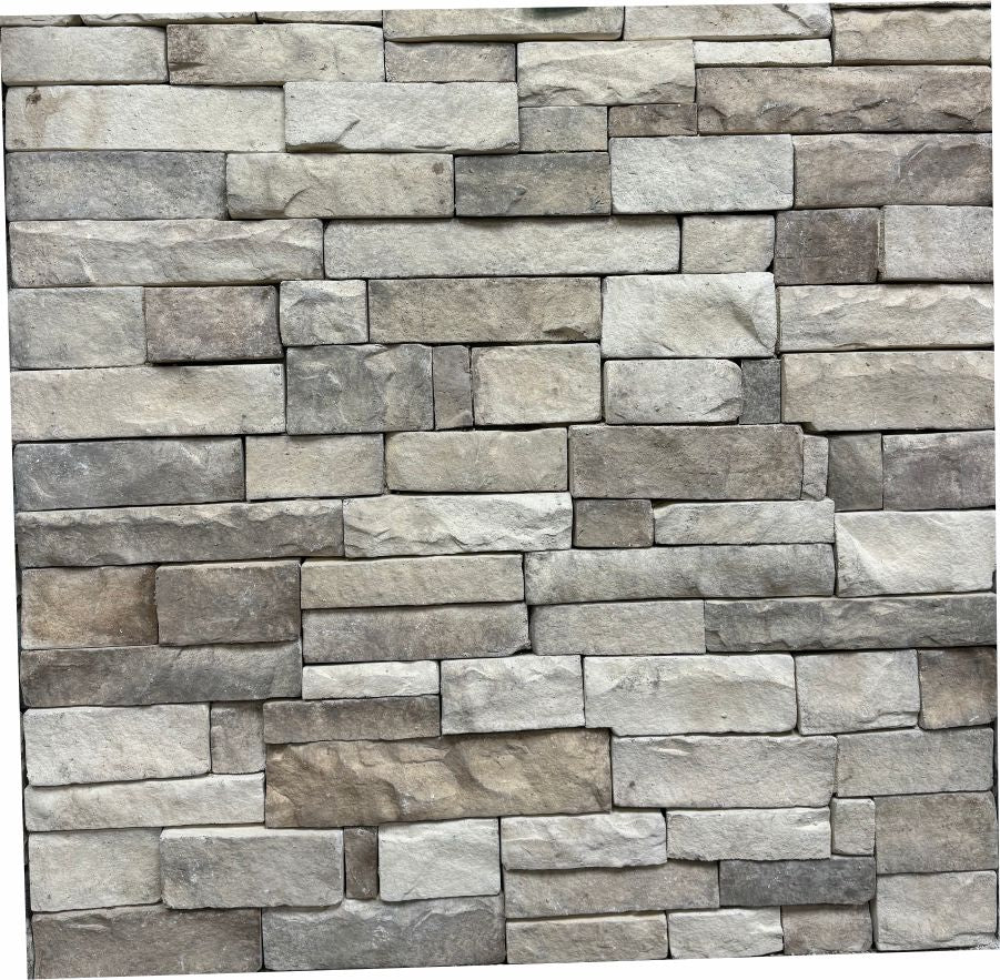 Ledge – Natural Blend sample board. Gray, tan and cream ledge pieces in a tight drystack.