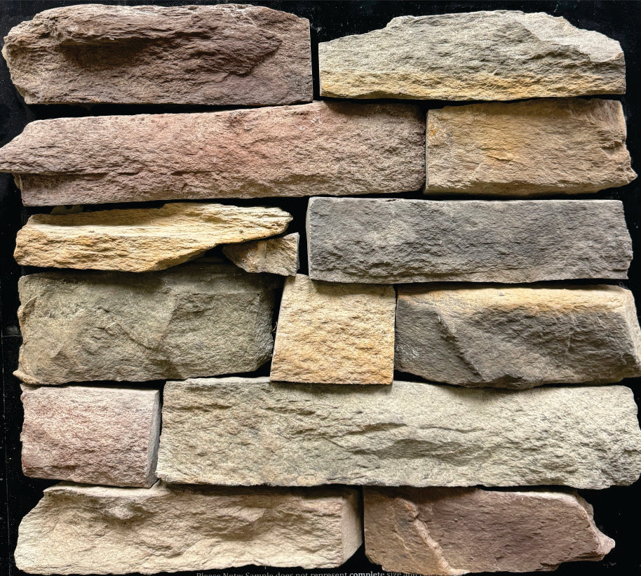Southern Ledge – Bucks Country sample board. Cream, buff, gold and plum pieces with a natural cleft face.