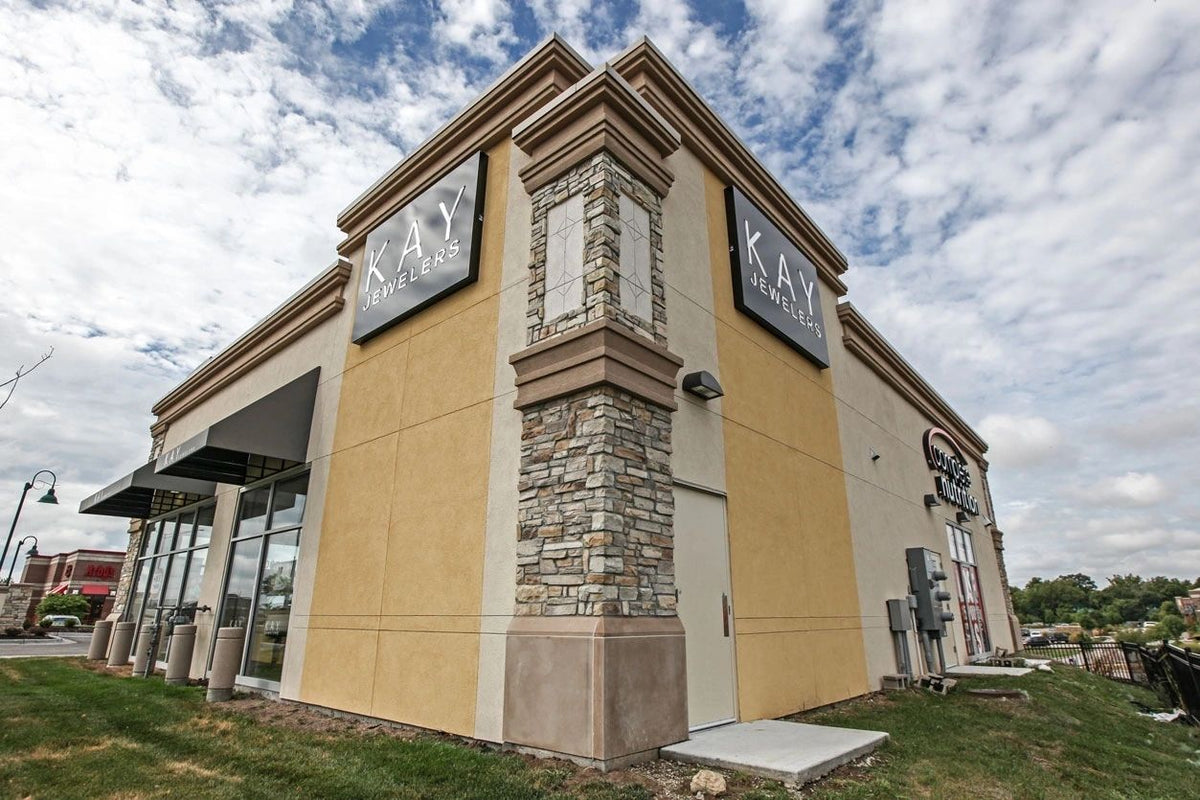Commercial building corner clad in stone veneer, Kansas City area