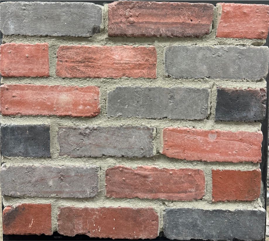 Brick – School House sample board. A mix of salmon red and slate gray bricks, like a reclaimed schoolhouse wall.
