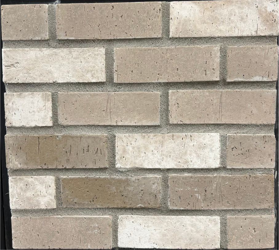 Brick – Sioux City sample board. Soft tan and taupe bricks with a pitted texture and gentle color shifts.