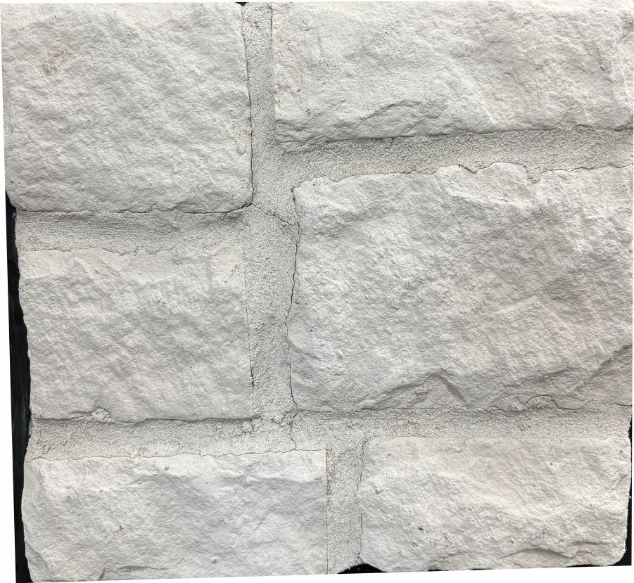 Classic – Snow sample board. Bright white with a heavy rock face and a light mortar joint.