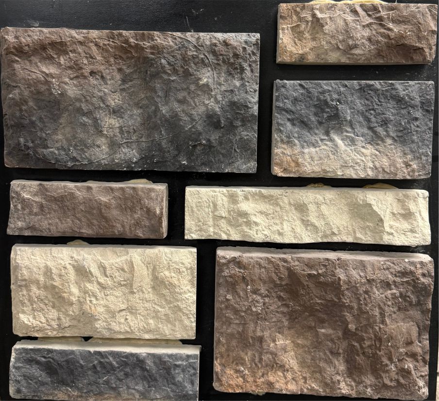 Dimensional – Lakewood sample board. A blend of brown, charcoal and cream blocks with a chiseled face.