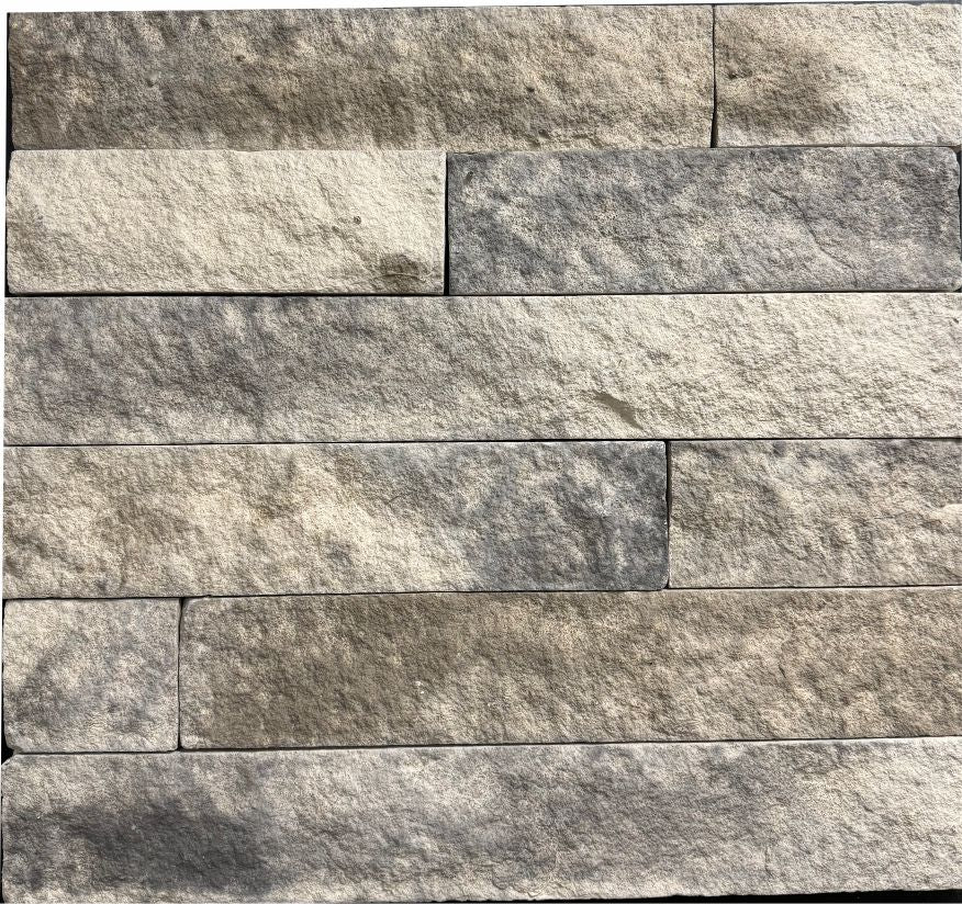 3" Strip Ledge – Granite sample board. Gray and cream three-inch strips with a speckled, granite-like face.