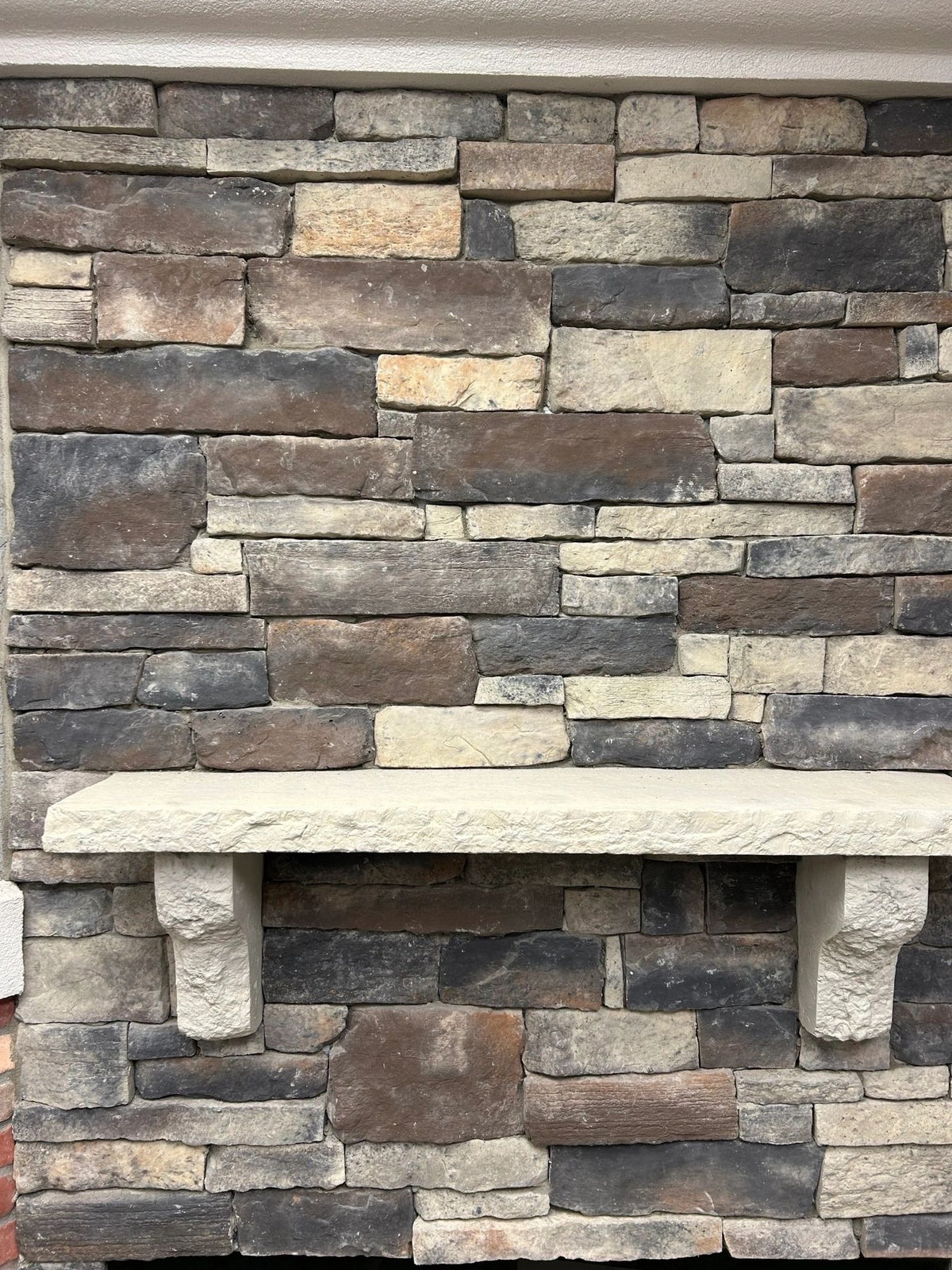 Fireplace surround in Country Ledge manufactured stone veneer, Lakewood