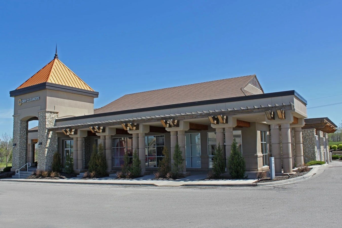 Clubhouse with a stone veneer tower and entry, Kansas City area