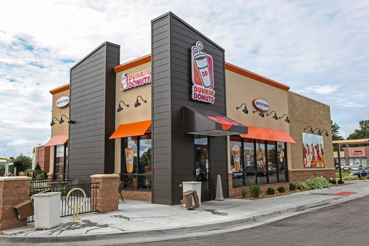 Fast-casual restaurant exterior with thin brick and stone veneer, Kansas City area