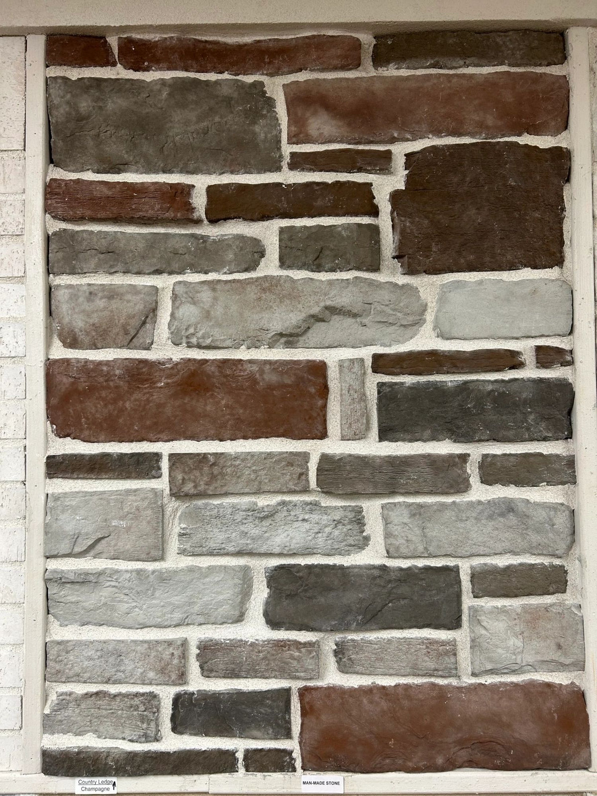 Country Ledge manufactured stone veneer, Champagne, installed