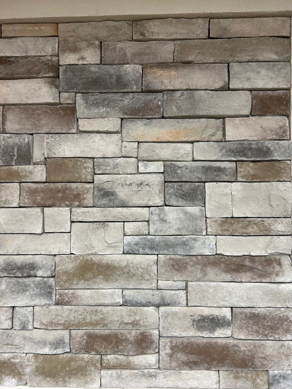 Ledge manufactured stone veneer, Huron, installed