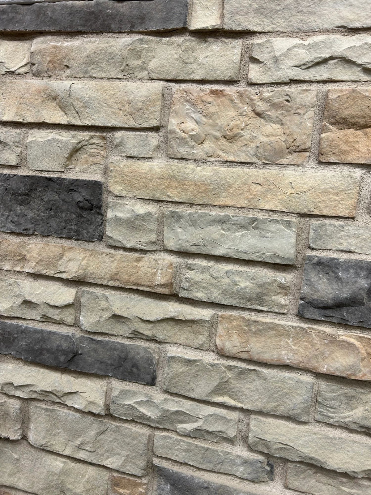 Ledge manufactured stone veneer, Suede, installed