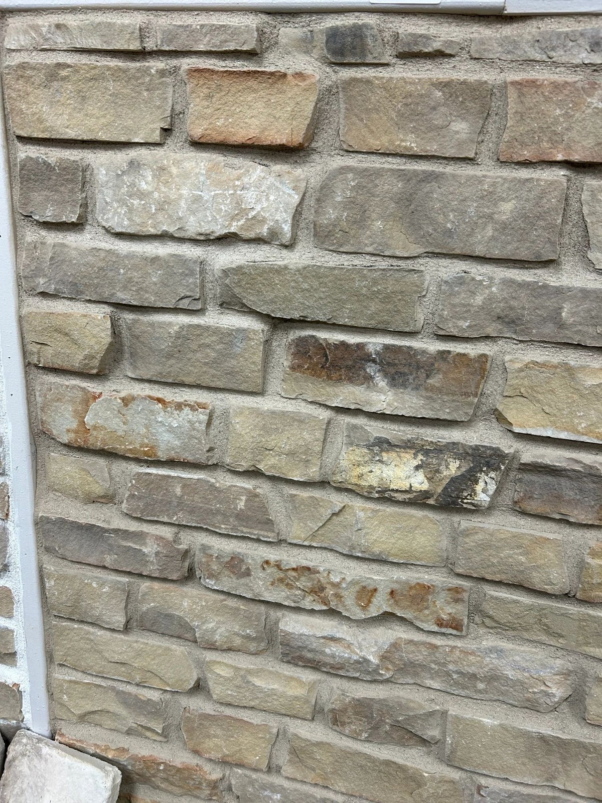 Installed coursed stone veneer wall, close-up