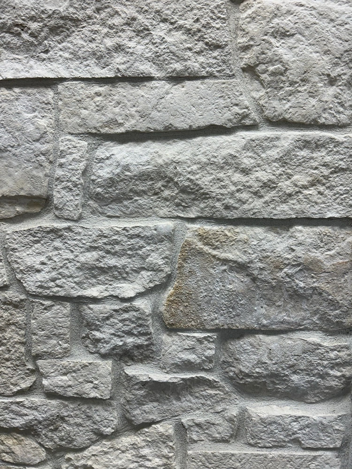 Natural white thin stone veneer, installed