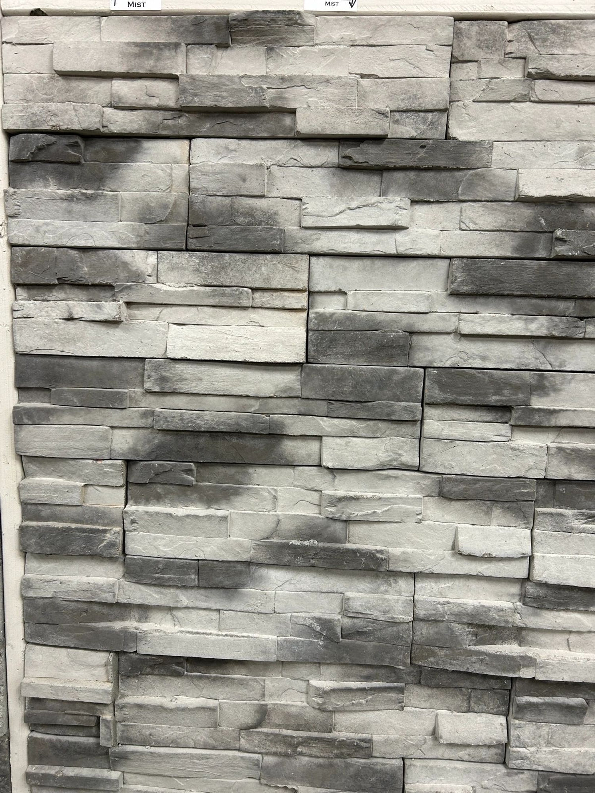 Strip Ledge manufactured stone veneer, Mist, installed